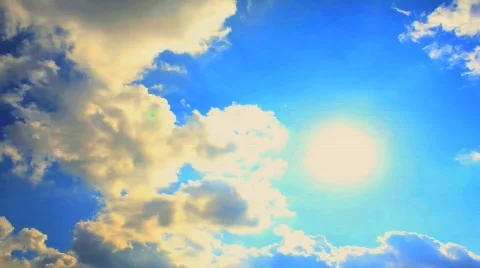 Puffy Clouds time lapse with sun rays Vídeos de archivo 459185