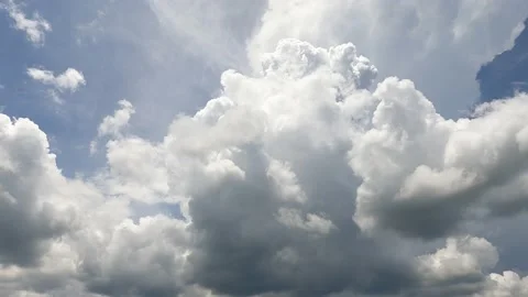 Puffy fluffy white cloud n dark rain storm cloudscape Stock Footage 157163908