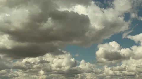 Puffy fluffy white clouds. Cumulus cloud cloudscape timelapse. Stock Footage 143684365