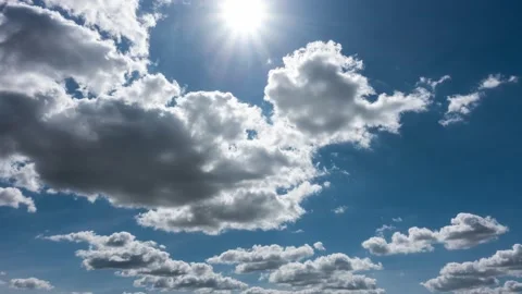 Puffy fluffy white clouds sky time lapse. Stock Footage 154113304