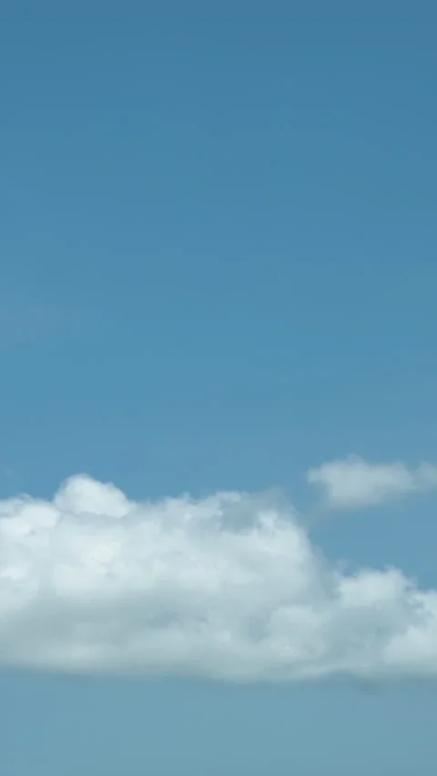 Puffy fluffy white clouds sky time lapse. slow moving clouds. B Roll Footage Stock Footage 212384119