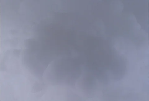 A puffy powder gray cloud effect builds and gradually darkens. Video stock 86705033