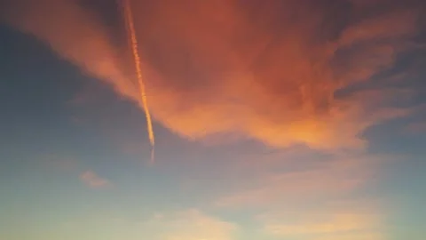 Puffy sunset cloud - Drone camera drops down Big Power Line Stock Footage 141424081