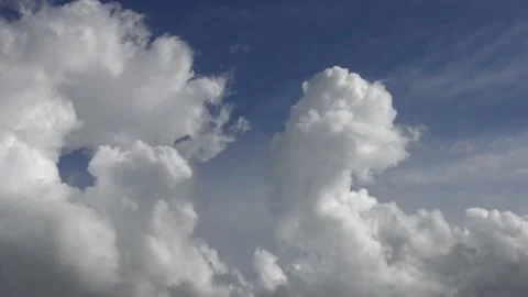 Puffy white clouds blown in the wind Stock Footage 159075078
