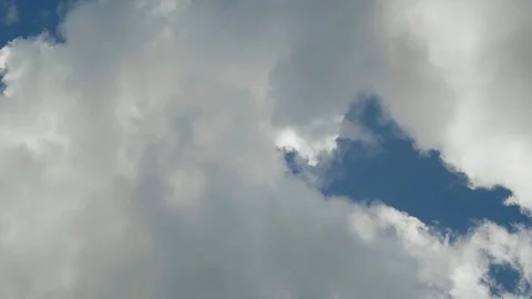 Puffy White Clouds in the sky - Blue Bird Day Video stock 90396663