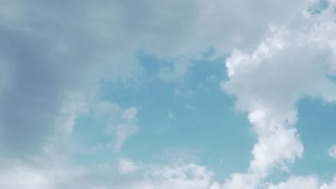 Puffy White Delicate Clouds Float across the Light Blue Sky, Time Lapse. Nature' Stock Footage 153807802