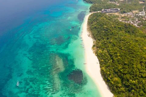 Puka Shell Beach. Wide tropical beach with white sand. Beautiful white beach and Stock Photos
