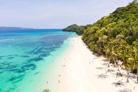 Puka Shell Beach. Wide tropical beach with white sand. Beautiful white beach and Stock Photos
