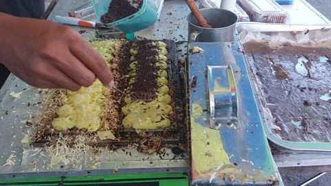 Pukis cake with sprinkle chocolate Stock Footage 236200446
