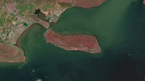 Pulau Poteran in the Java Sea on a satellite image taken in September 22, 202 Illustrazione stock