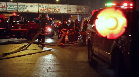 Puling Fire Hose Stock Footage 645351