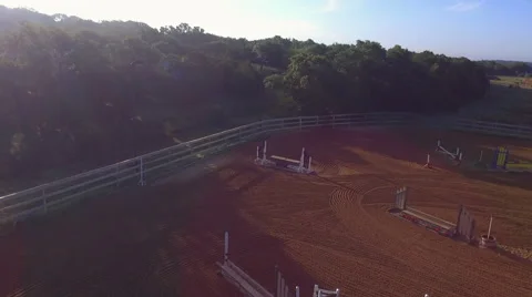 Pull Away from Central Texas Equestrian Arena at Sunrise by Drone Stock Footage 68068725