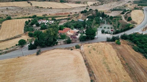Pull away drone aerial view over an American lush green suburban neighborhood. Stock Footage 277625360