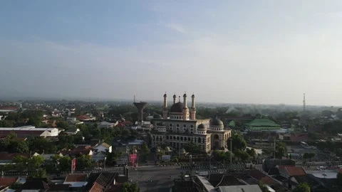 Pull away view from the big mosque with tower Stock Footage 259937079