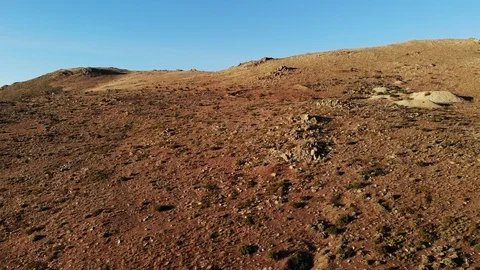 Pull Back Aerial of Desert Mining District in Nevada at Sunset Stock Footage 109534400