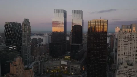 Pull back aerial from Nordstrom sign and twin towers near Central Park Stock Footage 344594927