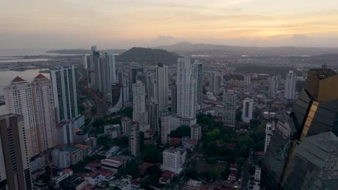 Pull Back Aerial Over Panama City Downtown Skyscrapers High-Rises at Sunset 動画素材 337941103