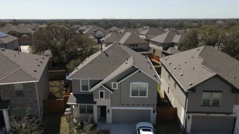 Pull Back and Rise Above New Homes in Austin Texas Stock Footage 217849466