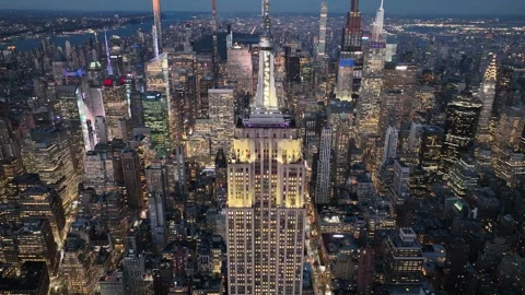 Pull Back and Tilt Up Away From the Empire State Setbacks Stock Footage 345289626