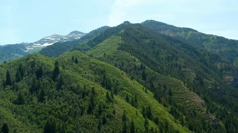 Pull back from beatiful lush mountains in Wasatch Mountain Range Provo Utah 4K Stock Footage 122534971