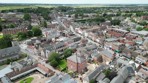 Pull back drone aerial reverse reveal Newmarket,High Street,Suffolk,UK Stock Footage 247164965