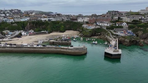 Pull back drone aerial reverse reveal Newquay Cornwall UK Stock Footage 255584152