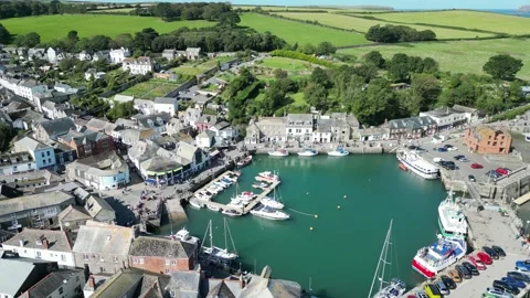 Pull back drone aerial reverse reveal Padstow Cornwall UK Stock Footage 255761726