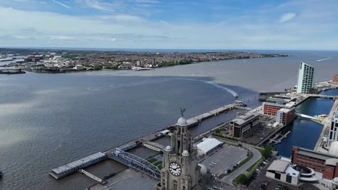 Pull back drone aerial reverse reveal Royal Liver building Liverpool UK Stock Footage 336009830