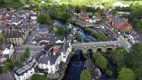 Pull back drone aerial reverse reveal Llangollen Bridge River Dee North Wales Stock Footage 336566777