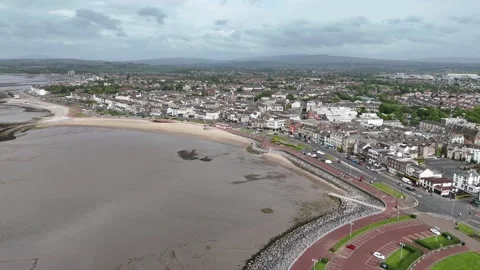 Pull back drone aerial reverse reveal Morecambe seaside town UK Stock Footage 336693674