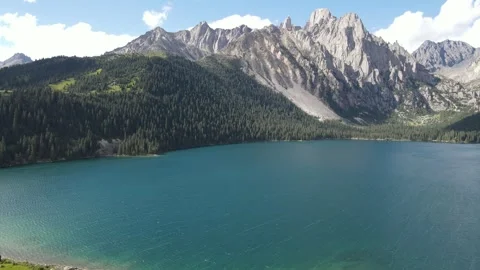 Pull Back Drone Revealing Alpine Lake in Cuopu Valley Sichuan China Video stock 330279585