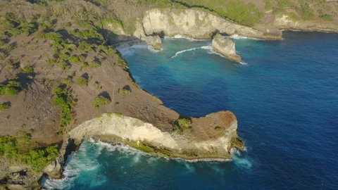 Pull Back Drone Shot of Blue Lagoon Penida at Nusa Penida, Bali - Indonesia Stock Footage 113818070
