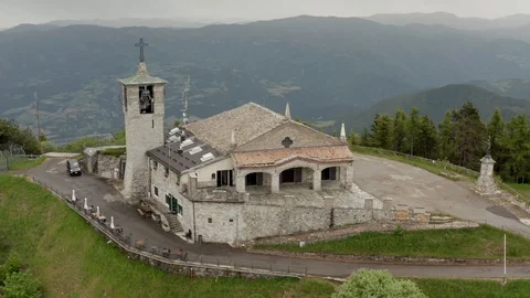 Pull back drone shot of the sanctuary on the mountain Penice, Italy Видео 116773914