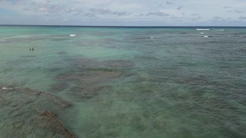Pull back drone shot of turquoise ocean Stock Footage 310212908