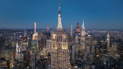 Pull Back on the Empire State Building dancing lights at Blue Hour Stock Footage 345289743