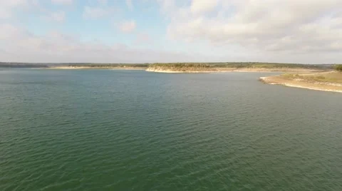 Pull back of fall lake shot in morning sun Stockbeeldmateriaal 46729850