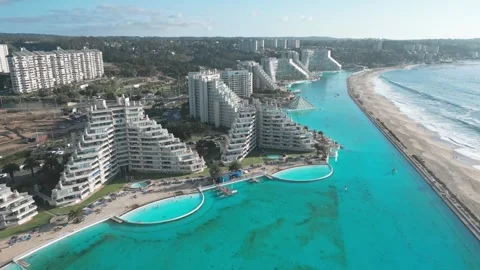 Pull back flight over San Alfonso del Mar resort complex revealing luxury Stock Footage 336268273