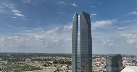 Pull back flight from the tallest building viewing downtown Oklahoma City Stock Footage 335674122