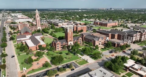 Pull back flight viewing campus buildings Stock Footage 335673746