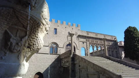Pull back from the gothic facade of the Papal Palace in Viterbo, Lazio Stock Footage 152893441