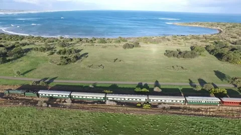 Pull back of Historical railway vintage steamranger to Port Elliott Stock Footage 55921187