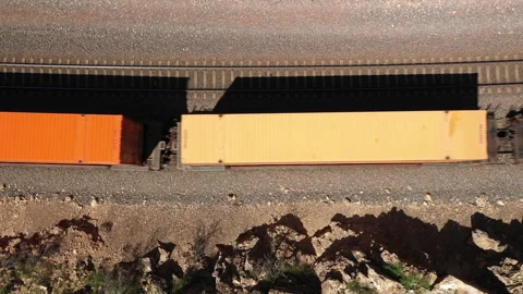 Pull back movement over container stack train Stock Footage 316114626