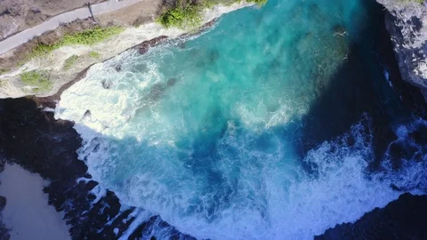 Pull Back Orbit Top Down Shot of Pasih Uug Broken Beach at Nusa Penida, Bali Stock Footage 113892952