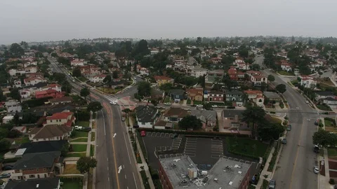 Pull back over city Down town overcast Stock Footage 123687306