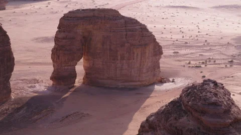 Pull back reveal of Elephant Rock Al Ula, Saudi Arabia. sunrise, 4K. Stock Footage 196806115