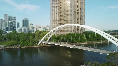 Pull back reveal of the Humber river pedestrian bridge Stock Footage 163135769
