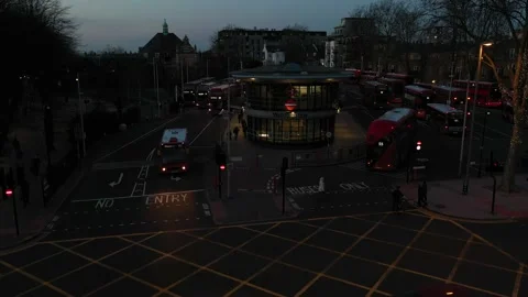 PULL BACK REVEAL OF WALTHAMSTOW TRAIN STATION AT NIGHT Stock-Footage 150003996