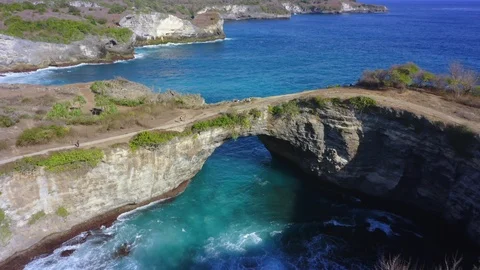 Pull Back Revealing Shot of Pasih Uug Broken Beach at Nusa Penida, Bali - Ind Stock Footage 113889769