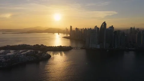 Pull Back Right Panning Drone Shot of Panama City Downtown Skyline at Sunset Video stock 333597801