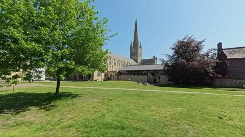 Pull back shot of the historic cathedral in the city of Norwich, Norfolk Stock-Footage 242390418